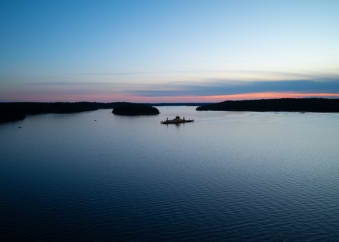 Ferry on Lake at Sunset