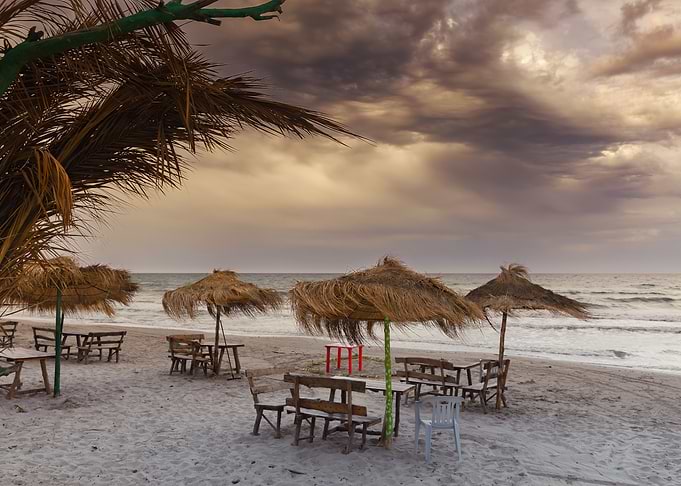 Beach Umbrellas and Tables at Dusk, Tunisia