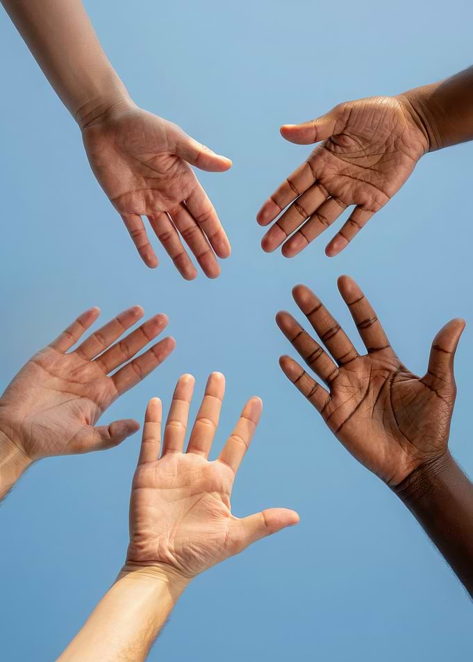 Diverse Hands Reaching Upward