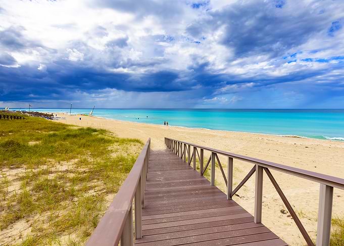 Beach Boardwalk Under Cloudy Sky, Varadero