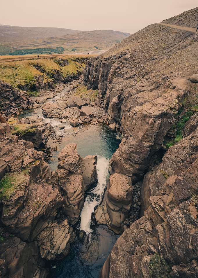 Icelandic Waterfall and Rocky Landscape