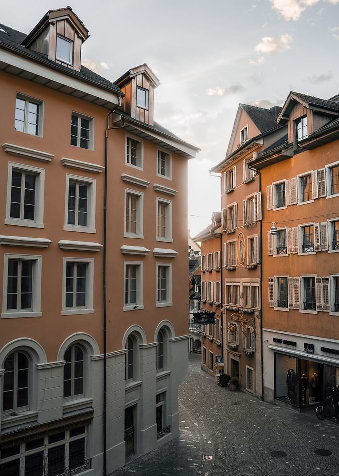 Switzerland street with old buildings and sunny wheater