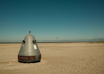 Metallic futurist structure on beach