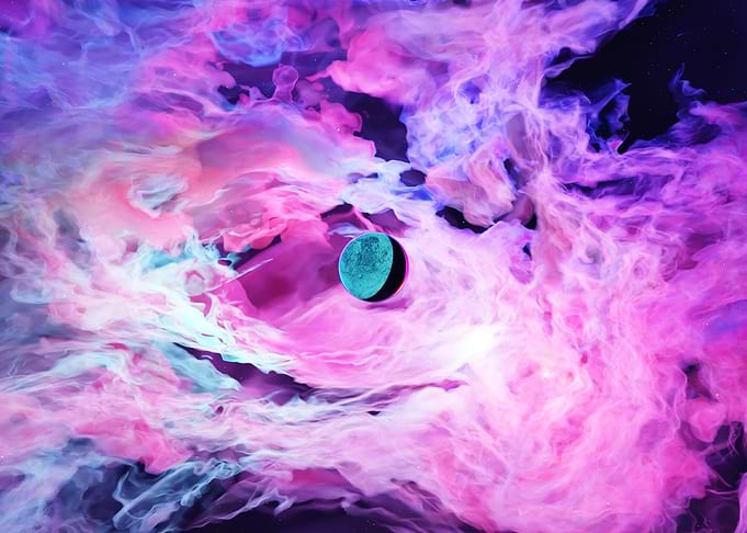 Turquoise Planet in Pink Nebula