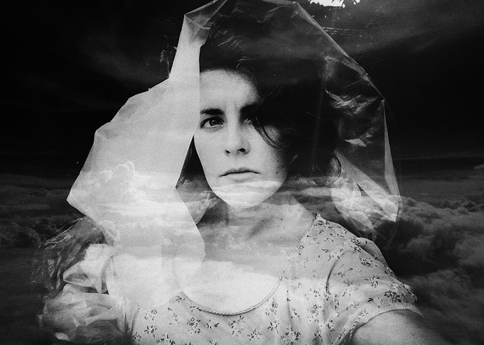Monochrome Portrait with Cloud Overlay