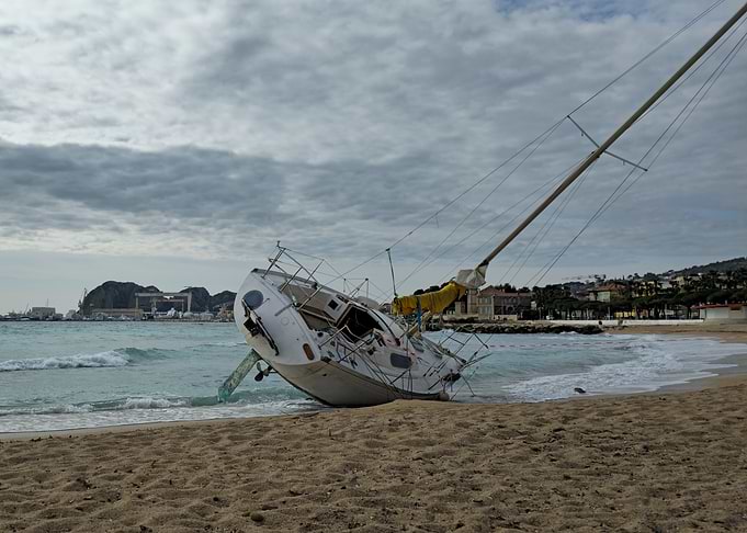 Stranded Sailboat on Sandy Beach
