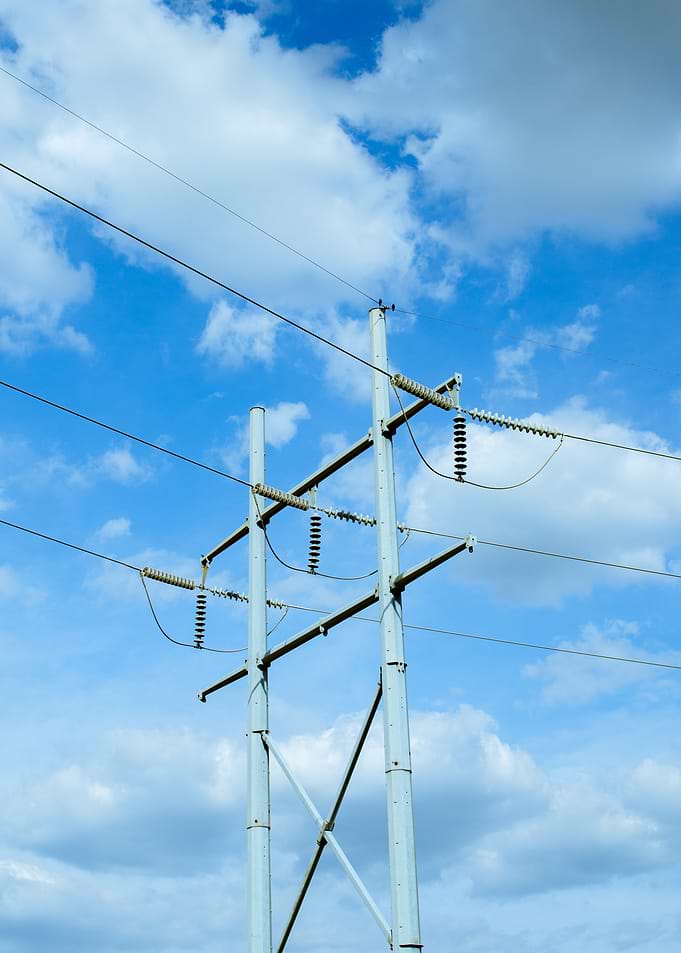 Electrical Tower Against Blue Sky