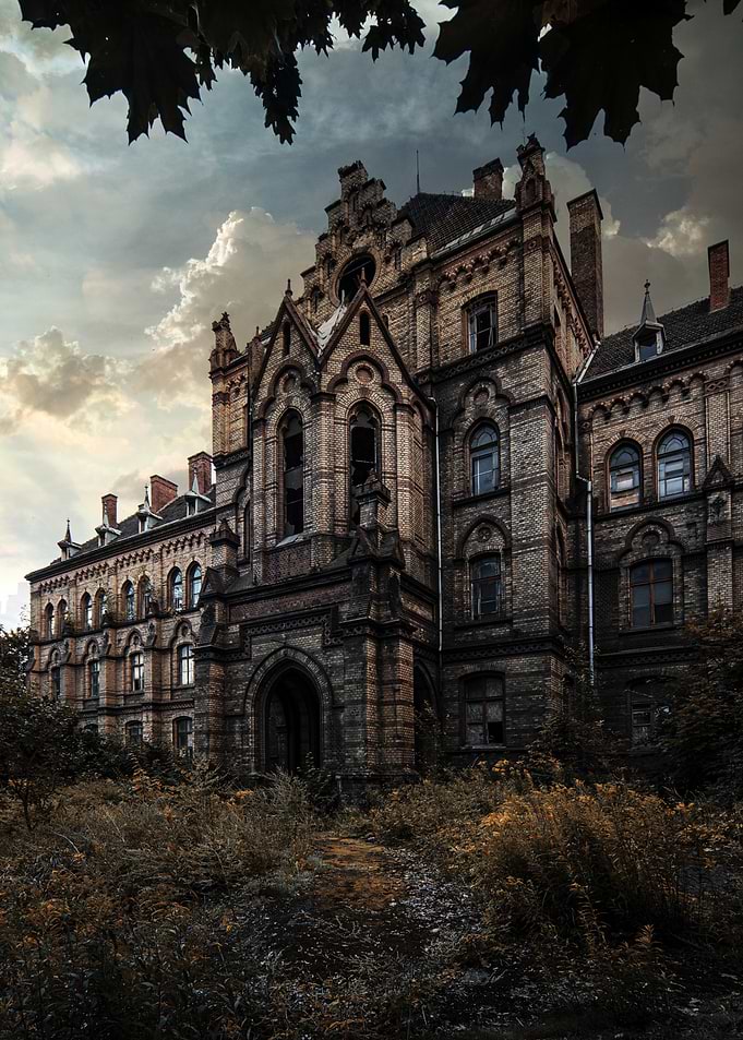 Abandoned Brick Building with Overgrown Grounds