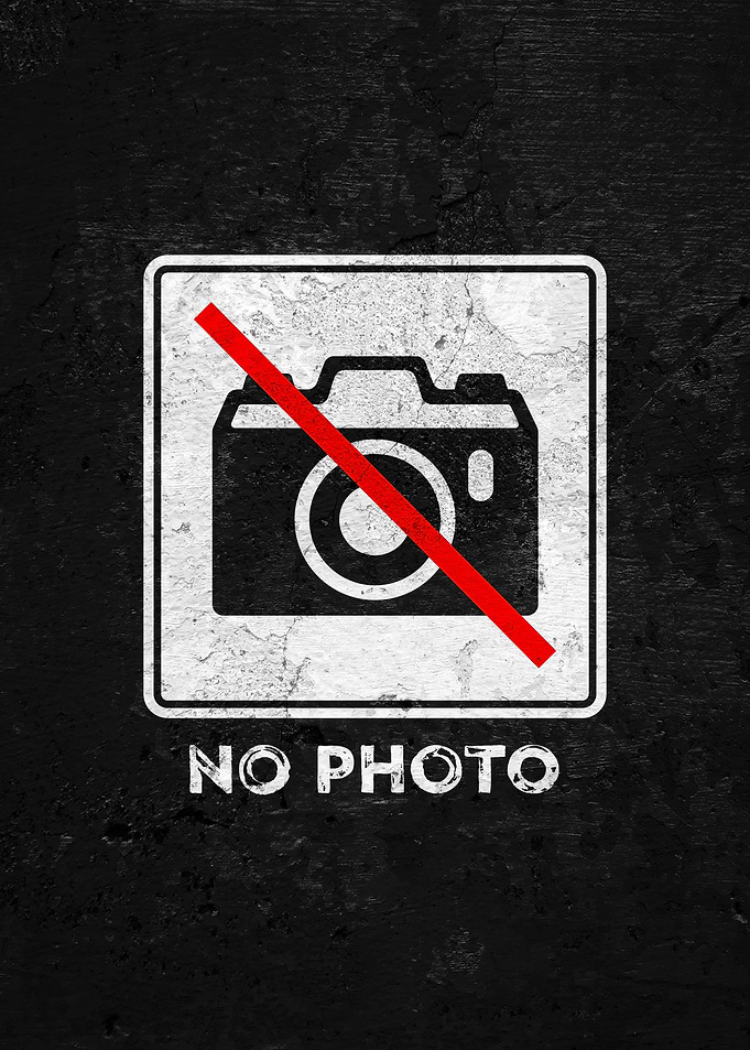 No Photo Sign on Black Wall