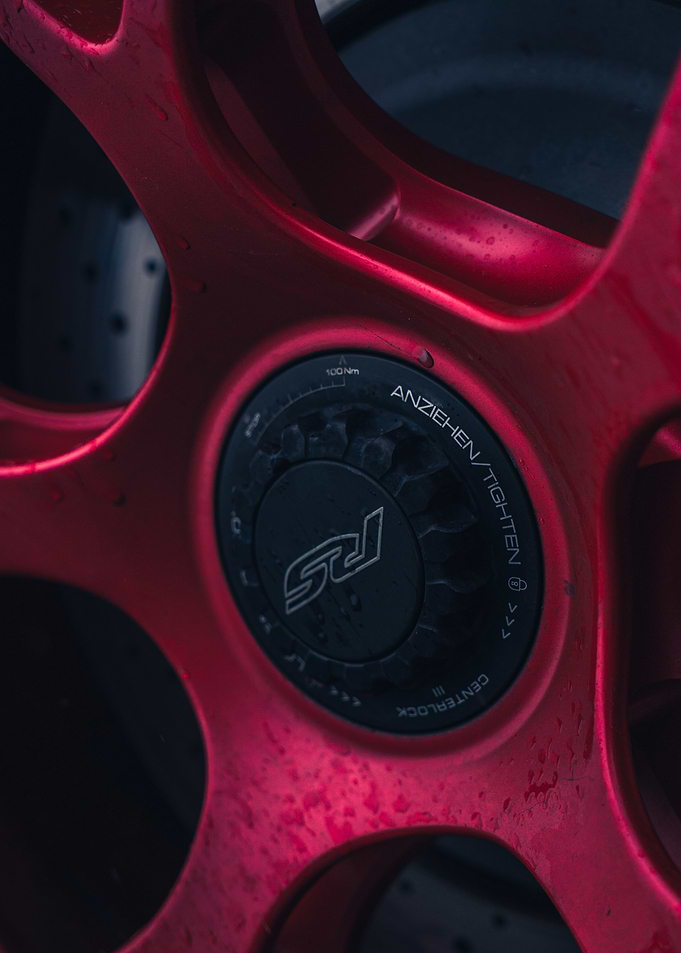 Red Car Wheel Close-Up