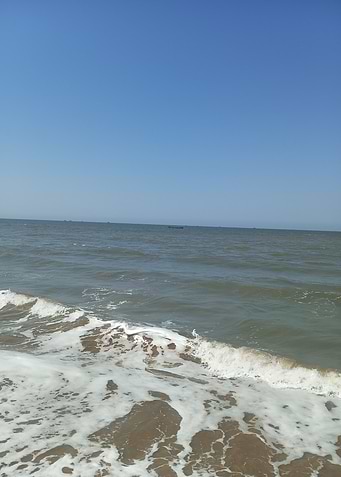 Ocean waves on a sandy beach