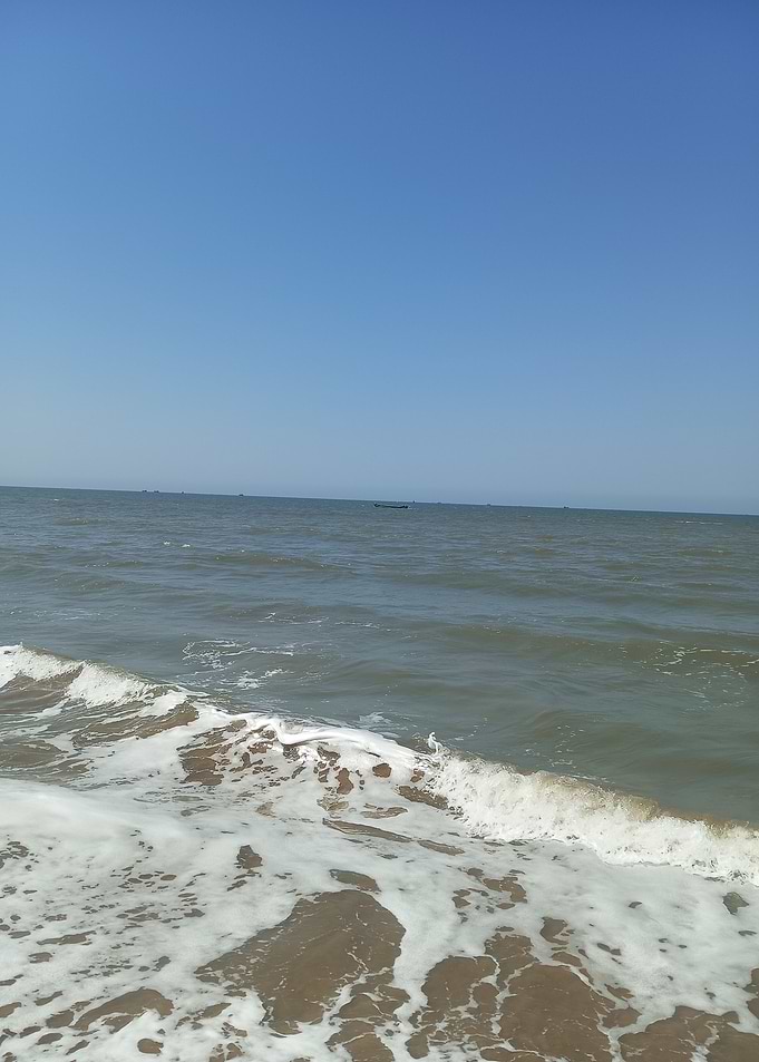 Ocean waves on a sandy beach