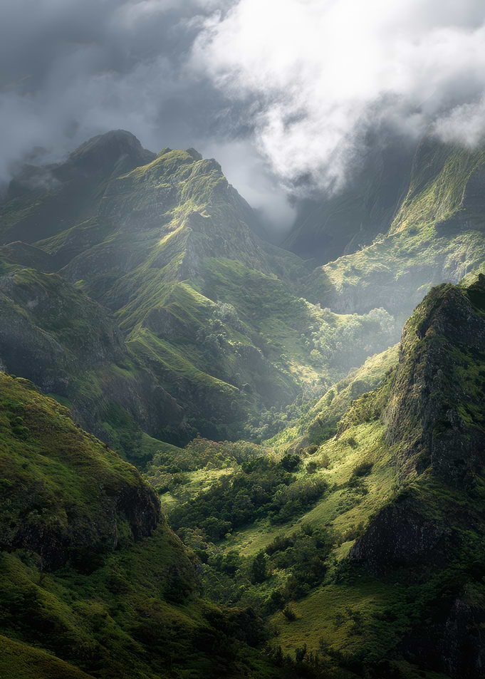 Lush Green Mountain Valley with Clouds