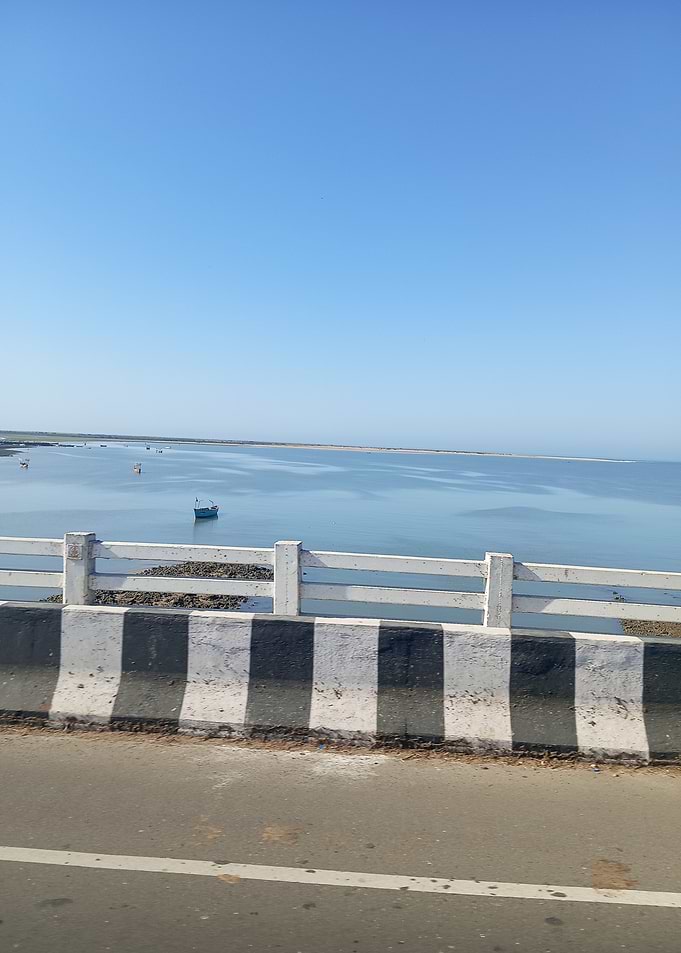 Bridge over water with boat