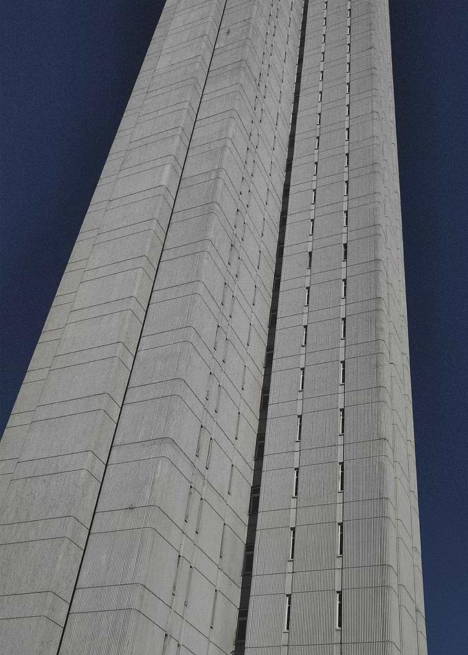 Retro Brutalist Concrete Skyscraper Against Blue Sky - Plattenbau