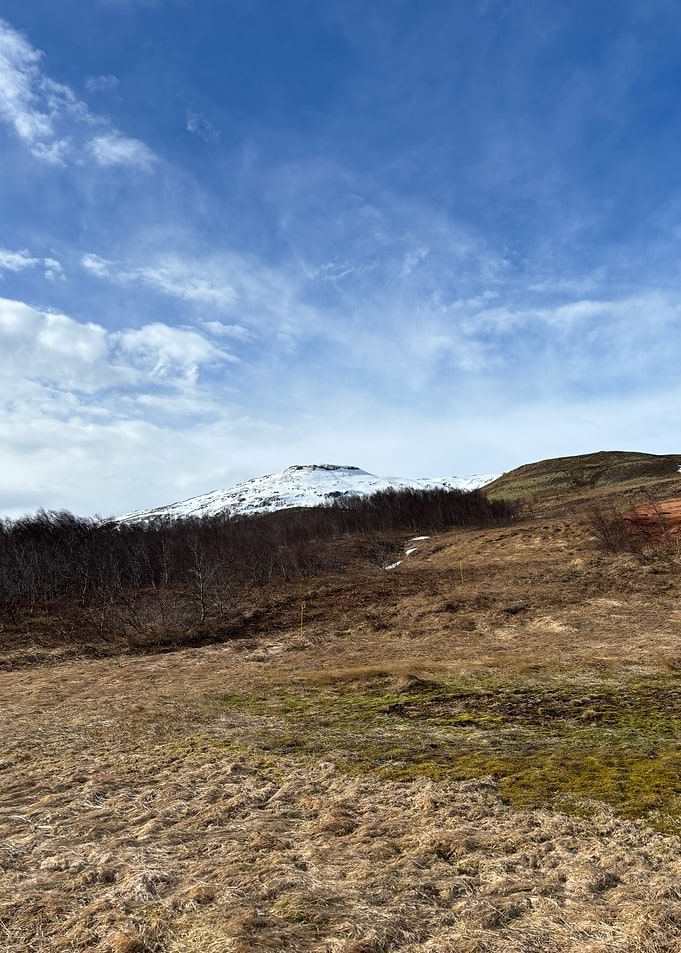 Snowy Mountain Landscape Under Blue Sky