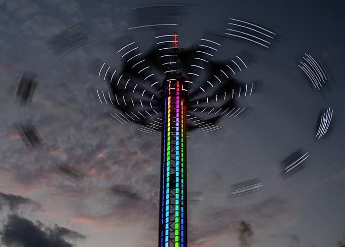 Colorful Spinning Ride at Dusk