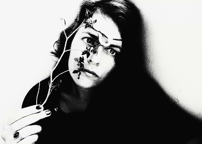 Monochrome Portrait with Floral Accent