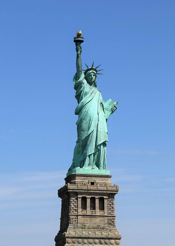 Statue of Liberty against blue sky