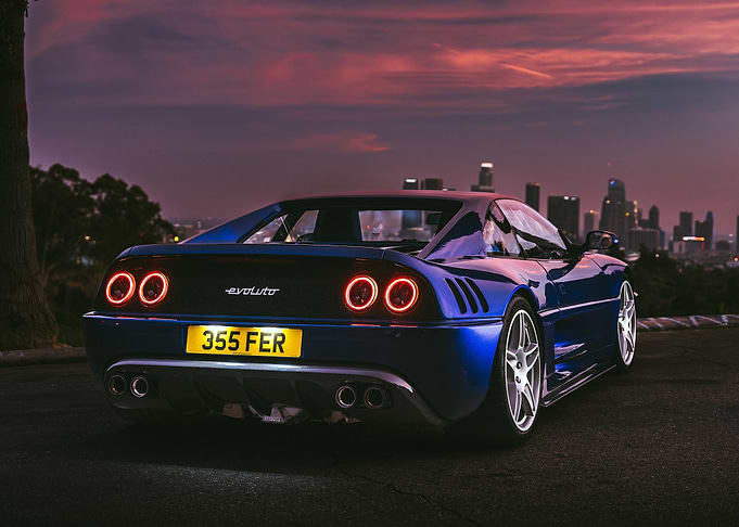 Blue Evoluto Car at Sunset