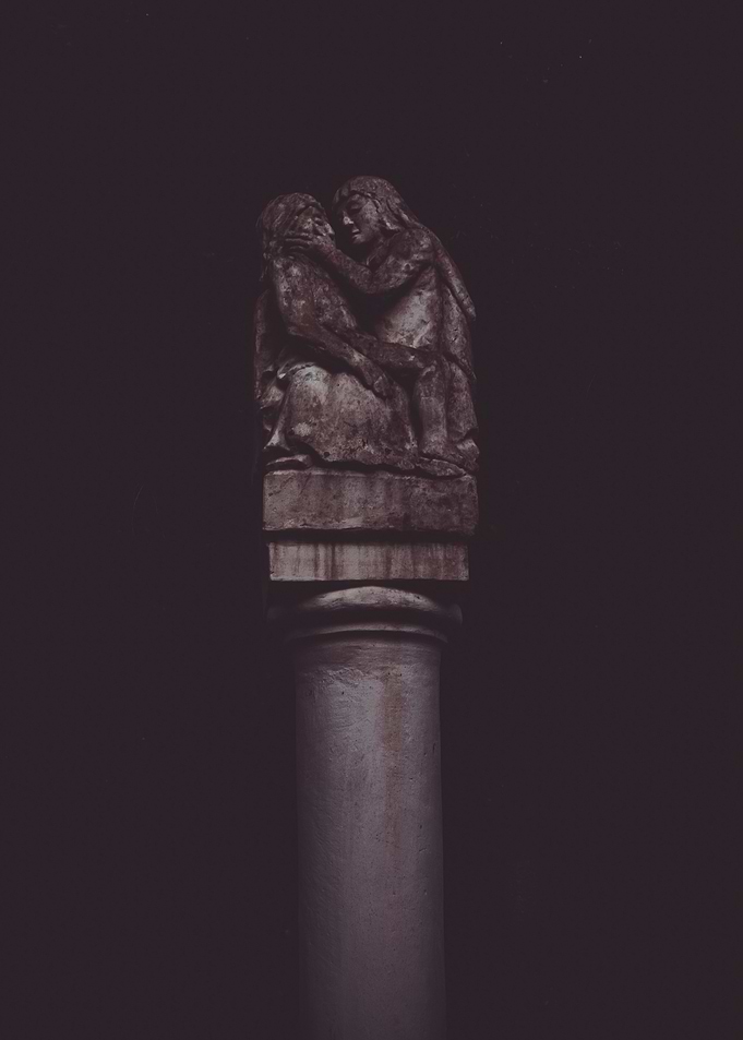 Stone Sculpture on Column