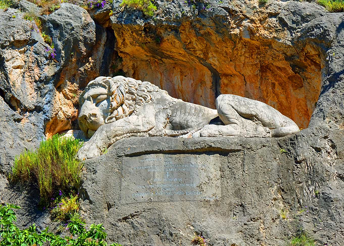 Lion Statue in Rock Formation
