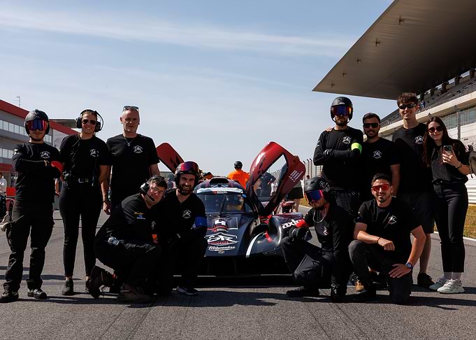 Racing Team with Car on Track
