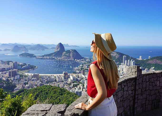 Woman overlooking Rio de Janeiro landscape, Brazil