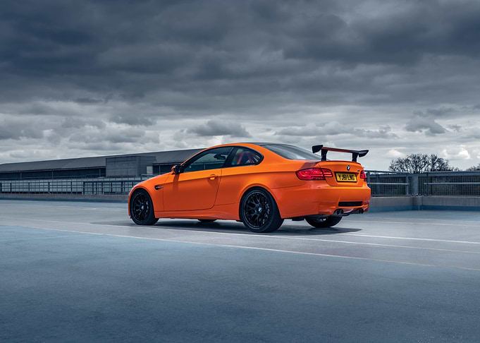 Orange BMW M3 on Rooftop