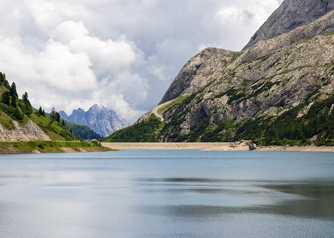 Fedaia lake and Mountains Landscape