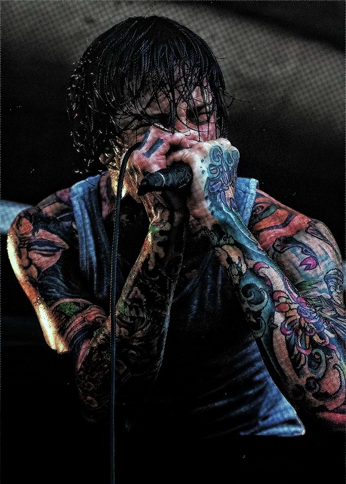 Tattooed Singer Performing Live