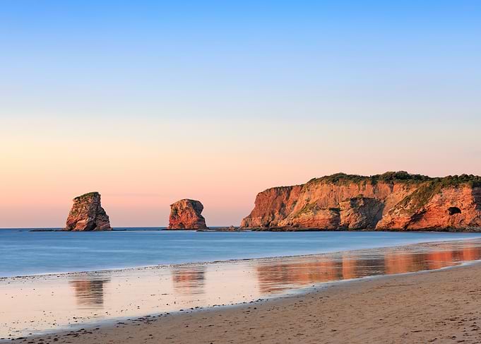Coastal Cliffs at Sunrise