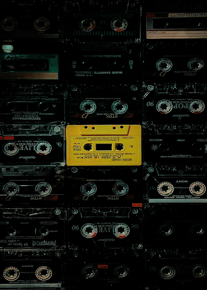 Cassette Tape Collection with Yellow Highlight