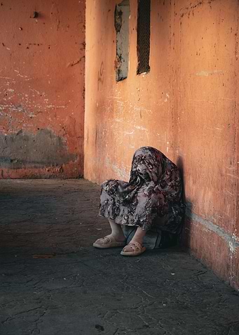 Seated Figure in a Deserted Corner