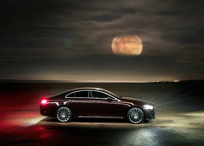 Maroon Car Under Full Moon