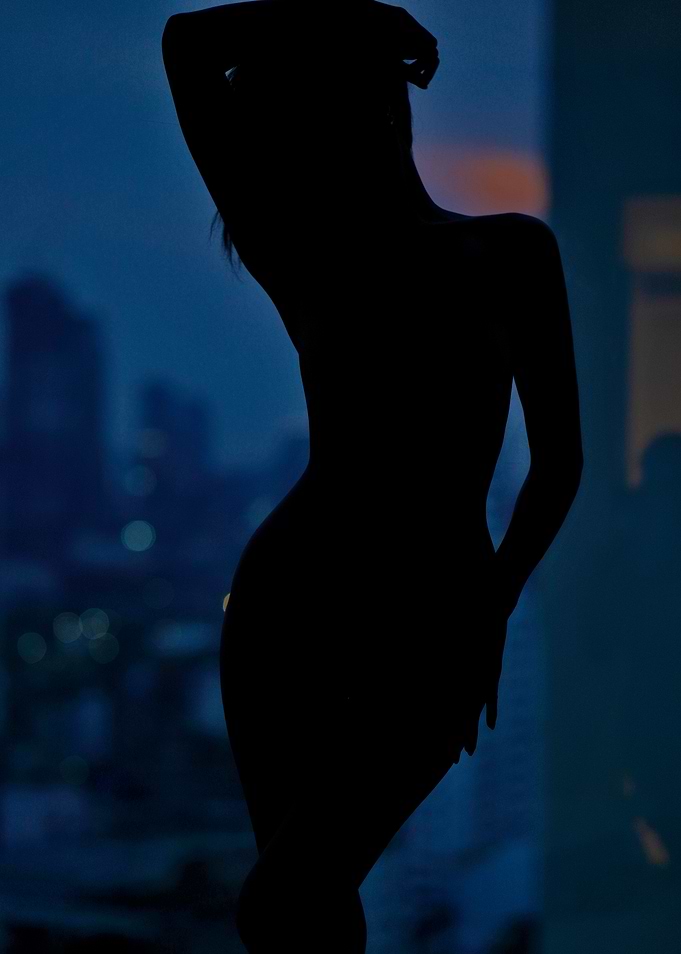 Bangkok Nights - Silhouette of a Woman at Night