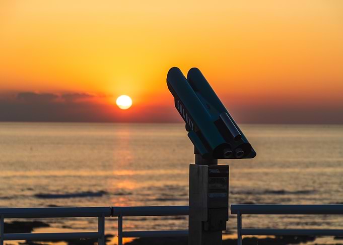 Sunset Seascape with Telescope