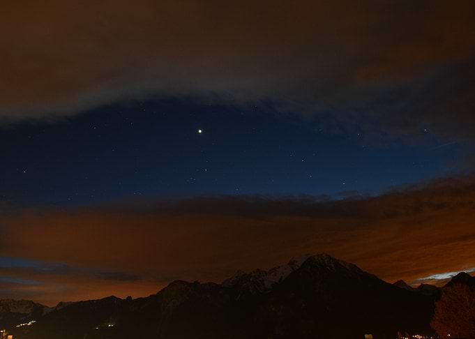 Venus and Night Sky Over Mountains