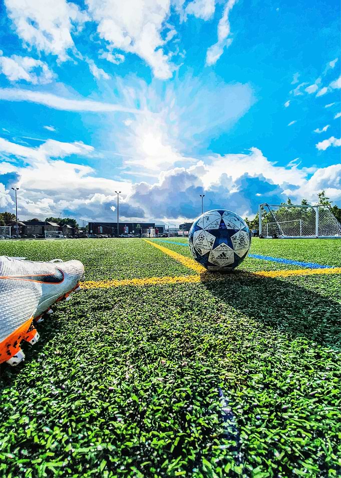 Soccer ball on a green field