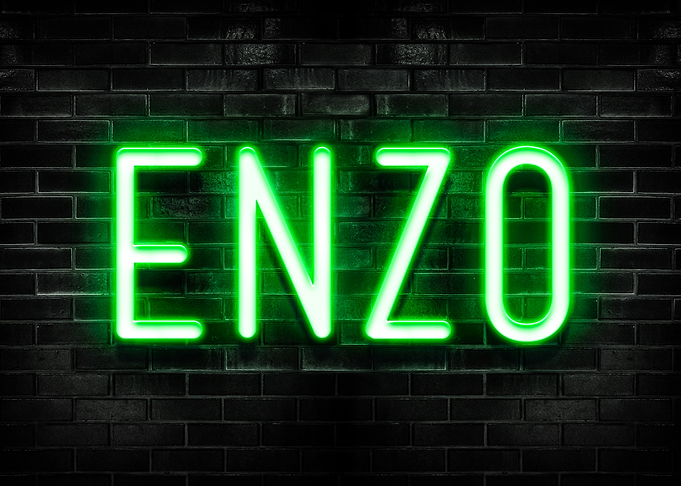 Enzo Neon Sign on Brick Wall