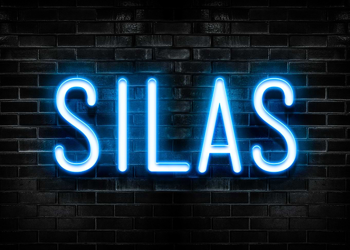 Silas Neon Sign on Brick Wall