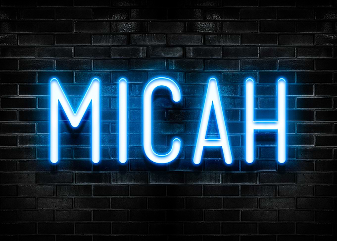 Micah Neon Sign on Brick Wall