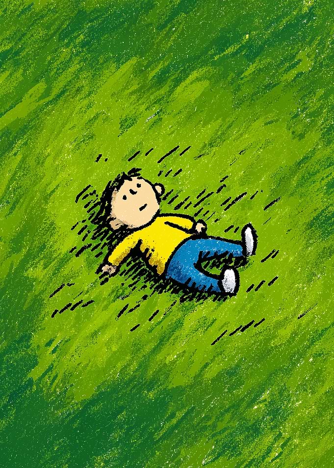 Boy Relaxing on Green Grass