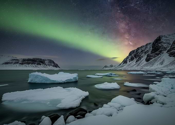 Iceland - Arctic landscape with aurora borealis