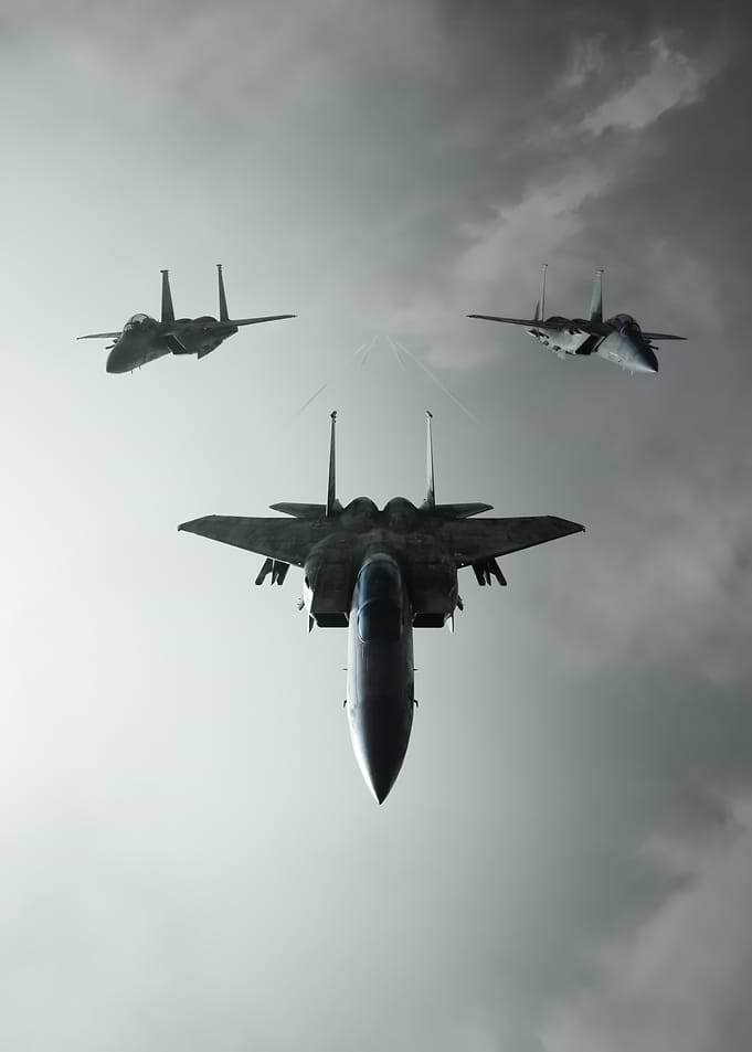 Three Fighter Jets in Cloudy Sky