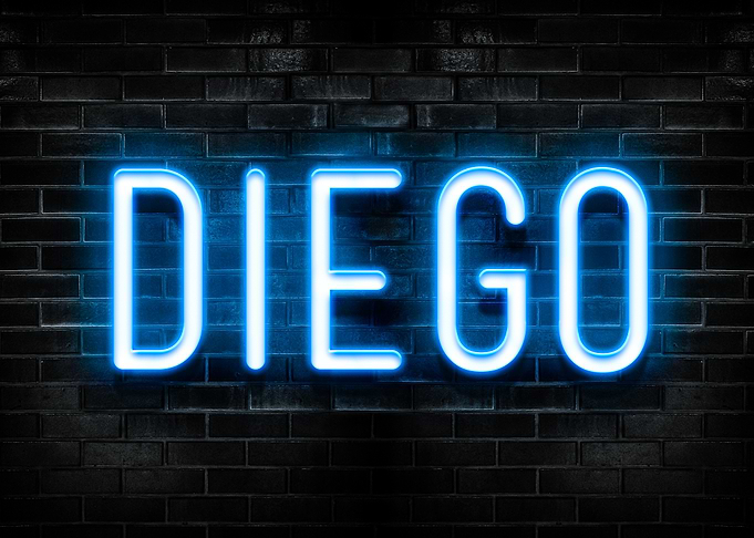 Diego Neon Sign on Brick Wall