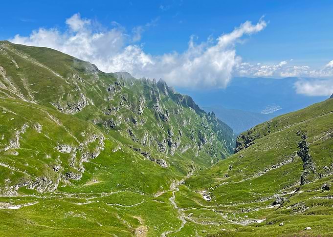 Green Mountain Valley Under Blue Sky