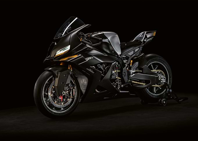 Sleek Black Motorcycle on Dark Background
