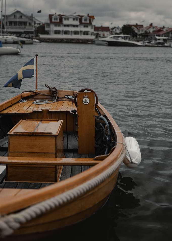 Wooden Boat with Swedish Flag