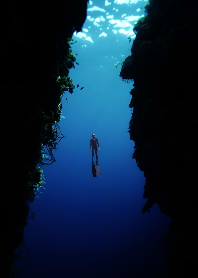Deep Sea Diver in Blue Abyss